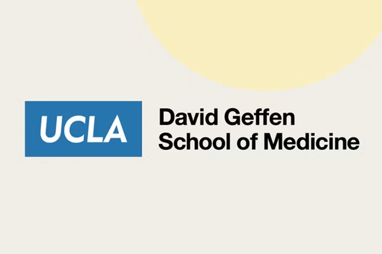 David Geffen School of Medicine logo on a sandstone background with a rising sun.